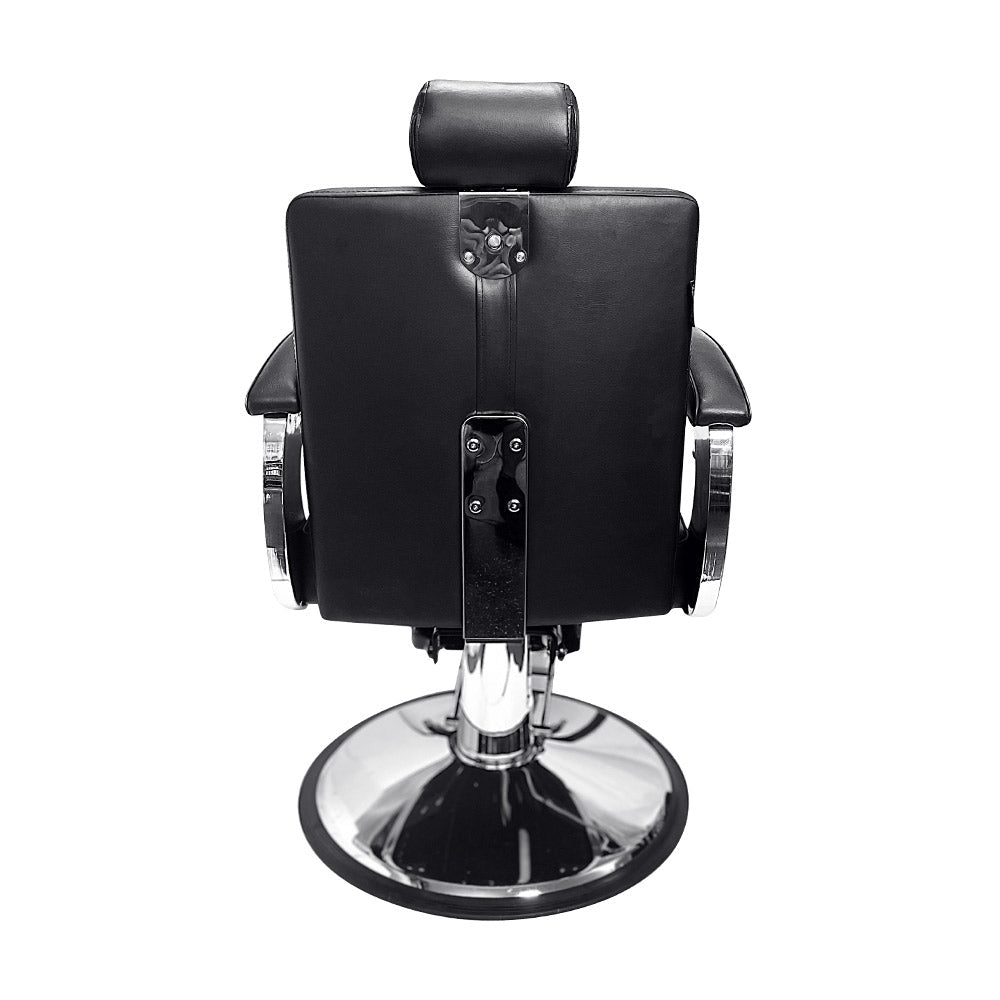 Black barber chair with chrome base on a white background