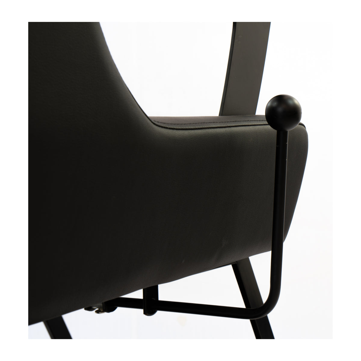 Karma Bowral Barber Chair in black showing close up of the lever feature.