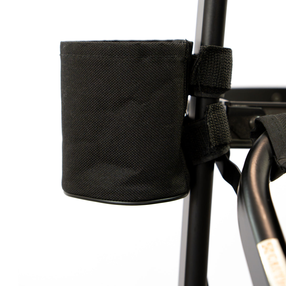 Close-up of the repositionable Velcro cup holder on the Karma St Ives portable makeup chair