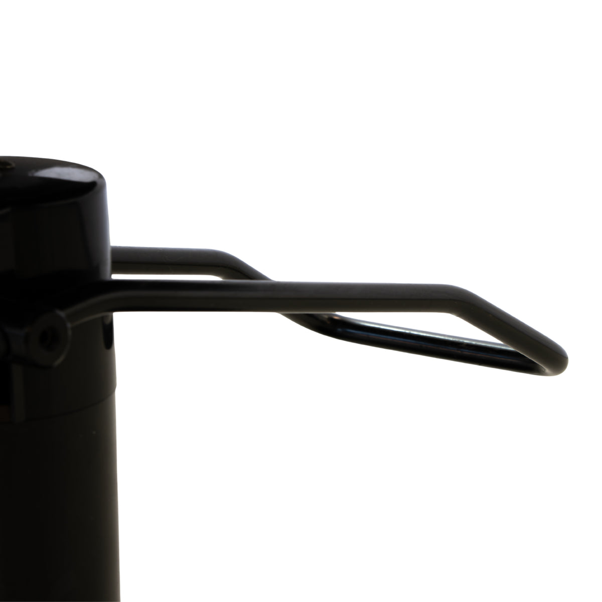 Close-up of the Karma Albury salon chair armrest in toffee