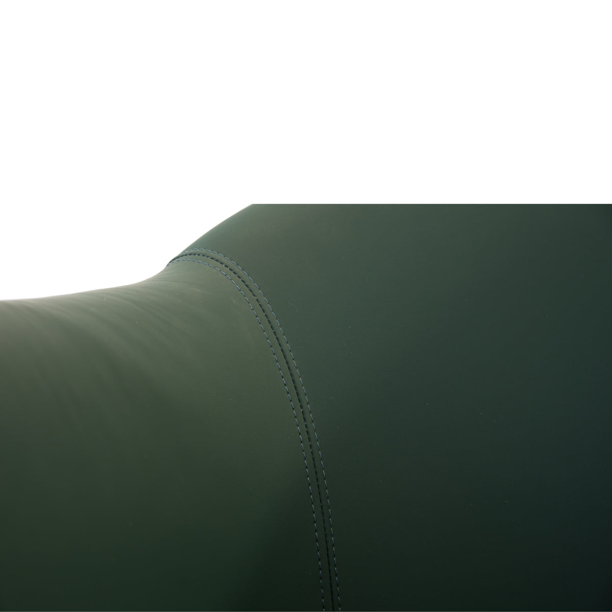 Close-up of the Karma Eden salon chair emerald green upholstery and stitching