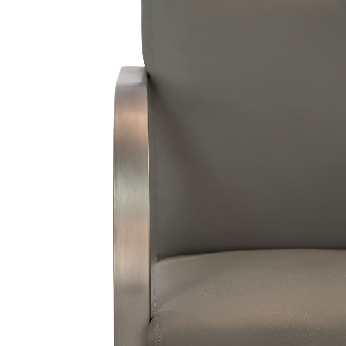 Close-up of the Karma Gosford salon chair showing the dark grey backrest and armrests