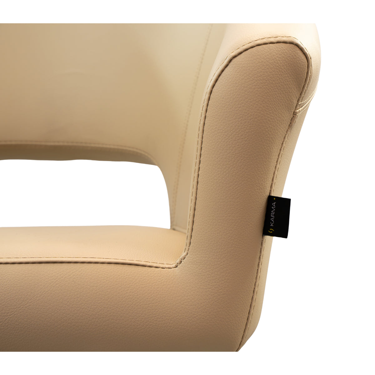 Close-up of the Karma Nundle salon chair hydraulic base and round platform in champagne finish